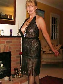 Aged dame playing with her knocker