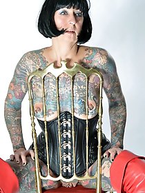 Photo shoot with full body tattooed MILF Cleo - 2