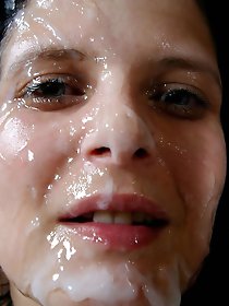 A brunette mother performs a flawless oral sex act during a gangbang