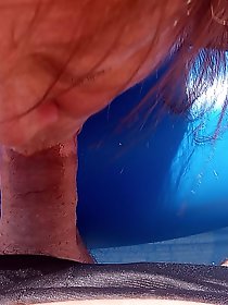 Enjoying oral pleasure beside the swimming pool